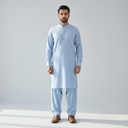 Man wearing shalwar kameez stitched from Gul Ahmed wash and wear Sky Blue fabric